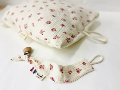 Le coussin de sieste avec cordon