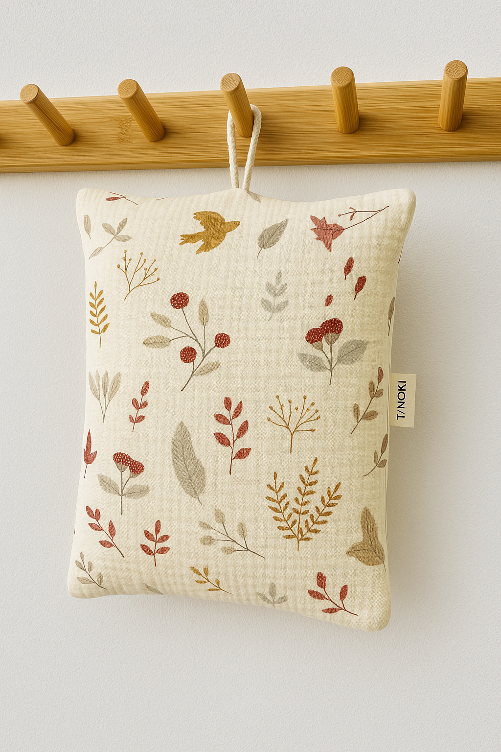 Le coussin de sieste avec cordon