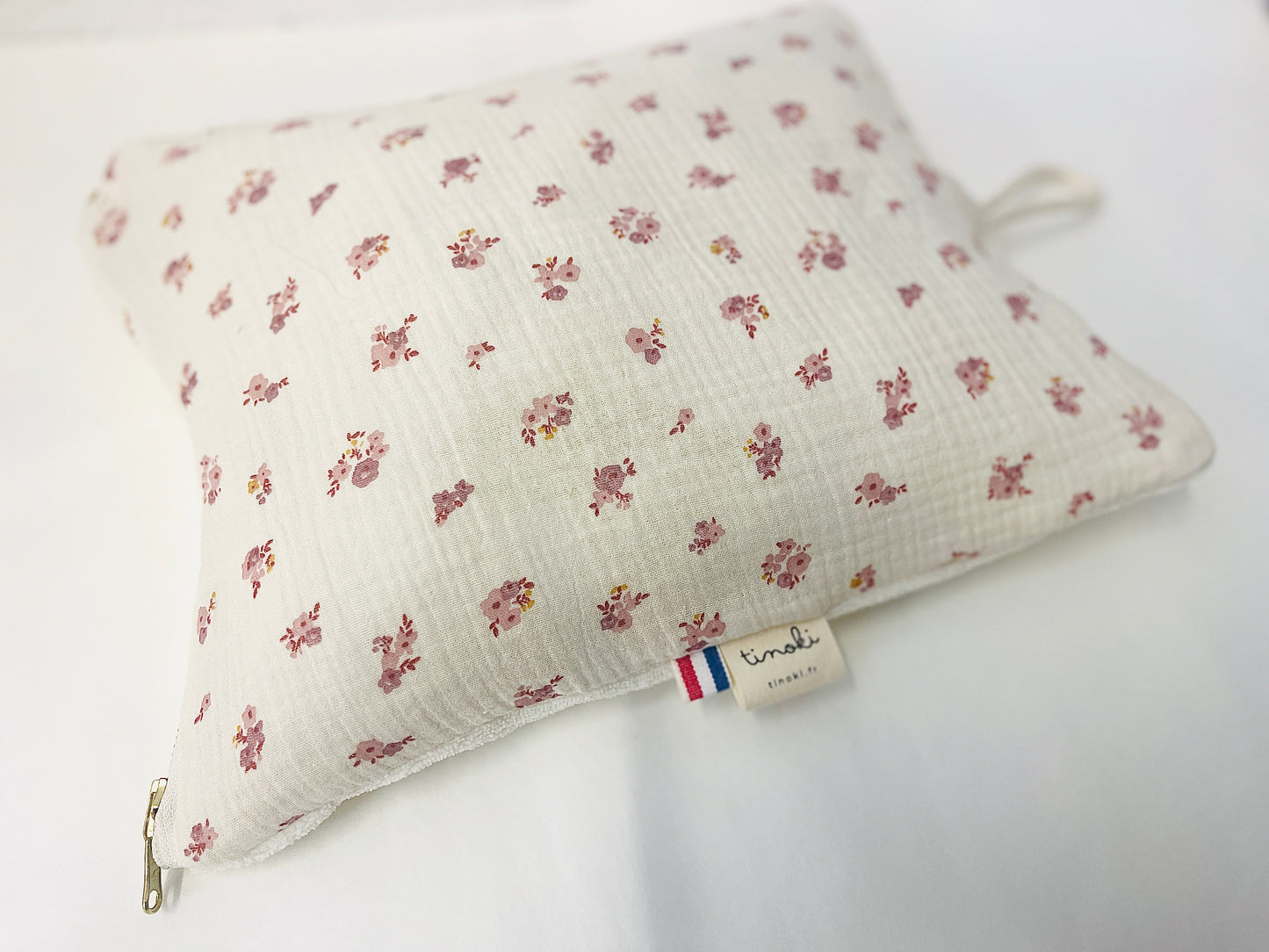 Le coussin de sieste avec cordon