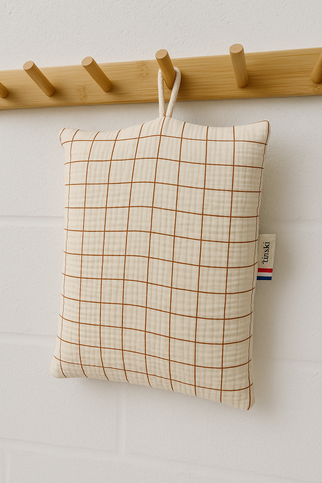 Le coussin de sieste avec cordon