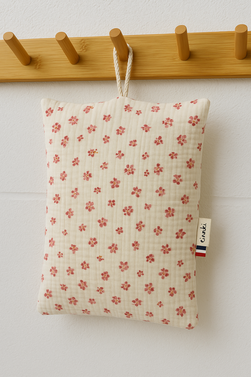 Le coussin de sieste avec cordon