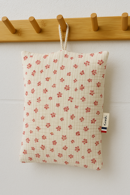 Le coussin de sieste avec cordon