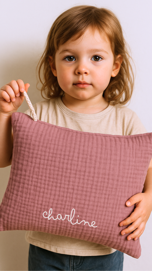 Le coussin de sieste avec cordon